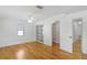 Bright bedroom with hardwood floors and walk-in closet at 702 Valencia Shores Dr, Winter Garden, FL 34787