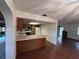 Kitchen with wood cabinets and breakfast bar at 157 Arthur St, Altamonte Springs, FL 32701