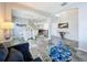 Modern dining room with white table and chairs, marble floors at 2510 Black Lake Blvd, Winter Garden, FL 34787