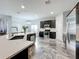 Modern kitchen featuring stainless steel appliances and white quartz countertops at 2510 Black Lake Blvd, Winter Garden, FL 34787