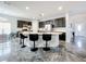 Spacious kitchen with island, stainless steel appliances, and dark cabinetry at 2510 Black Lake Blvd, Winter Garden, FL 34787