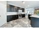 Bright kitchen featuring stainless steel appliances and a center island at 2510 Black Lake Blvd, Winter Garden, FL 34787