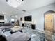 Spacious living room with marble floors, large TV, and comfortable seating at 2510 Black Lake Blvd, Winter Garden, FL 34787