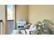 Relaxing balcony with wooden furniture and tropical plants at 607 Pensacola Ln, Lake Mary, FL 32746