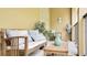 Outdoor balcony furnished with a bench and small table at 607 Pensacola Ln, Lake Mary, FL 32746