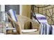 Close-up of wicker chair with blanket on balcony at 607 Pensacola Ln, Lake Mary, FL 32746