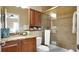 Bathroom with granite countertop and walk-in shower at 607 Pensacola Ln, Lake Mary, FL 32746