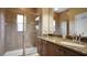 Bathroom with granite vanity, walk-in shower, and tiled flooring at 607 Pensacola Ln, Lake Mary, FL 32746