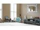 Bedroom corner with wicker chairs and a green cabinet at 607 Pensacola Ln, Lake Mary, FL 32746