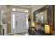 Bright and spacious entryway with decorative mirror and console table at 607 Pensacola Ln, Lake Mary, FL 32746