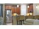 Modern kitchen with stainless steel appliances and wood cabinets at 607 Pensacola Ln, Lake Mary, FL 32746