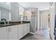 Modern bathroom with double vanity and walk-in shower at 612 Shoal Creek Dr, Ocoee, FL 34761