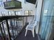 Private balcony with two chairs and city views at 6165 Carrier Dr # 2401, Orlando, FL 32819