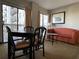 Small dining area with table and chairs at 6165 Carrier Dr # 2401, Orlando, FL 32819