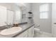Clean bathroom with single sink vanity, toilet and shower at 1380 Clear Brook Pl, St Cloud, FL 34772