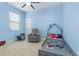 bedroom featuring Mickey Mouse decor and a twin bed at 1380 Clear Brook Pl, St Cloud, FL 34772