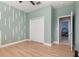 Light and airy bedroom with access to another room at 1380 Clear Brook Pl, St Cloud, FL 34772