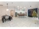 Open concept kitchen and dining area with island and stainless steel appliances at 1380 Clear Brook Pl, St Cloud, FL 34772