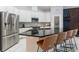 Modern kitchen with stainless steel appliances and an island at 1380 Clear Brook Pl, St Cloud, FL 34772