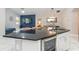 Modern kitchen with large island, wine cooler and breakfast bar at 1380 Clear Brook Pl, St Cloud, FL 34772