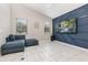 Living room features a sectional sofa and large TV at 1380 Clear Brook Pl, St Cloud, FL 34772