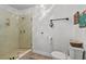 Clean bathroom with shower stall and updated flooring at 1409 Lake Marion Dr, Apopka, FL 32712