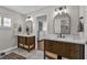 Double vanity bathroom with updated finishes and custom cabinetry at 1409 Lake Marion Dr, Apopka, FL 32712