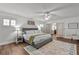 Spacious main bedroom with wood flooring and access to the en-suite bathroom at 1409 Lake Marion Dr, Apopka, FL 32712