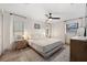 Spacious bedroom with king-size bed and ceiling fan at 1422 Tierra Cir, Winter Park, FL 32792