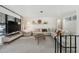 Open living area with sectional sofa and access to backyard at 1422 Tierra Cir, Winter Park, FL 32792