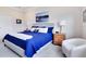 Bright bedroom featuring a king-size bed and ample natural light at 17543 Saw Palmetto Ave, Clermont, FL 34714