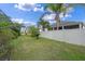 Landscaped backyard with privacy fence at 1827 Pisgah Ln, Apopka, FL 32712