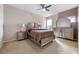 Bedroom with full bed and mirrored dresser at 1827 Pisgah Ln, Apopka, FL 32712
