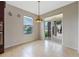 Bright breakfast nook with access to the backyard patio at 1827 Pisgah Ln, Apopka, FL 32712