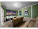 Home theater with projector and comfortable seating at 1827 Pisgah Ln, Apopka, FL 32712