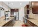 Modern kitchen features stainless steel appliances and ample cabinetry at 1827 Pisgah Ln, Apopka, FL 32712
