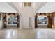 Bright and spacious living room with tile floors and large windows at 1827 Pisgah Ln, Apopka, FL 32712