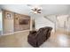 Living room with comfortable seating and a view to the kitchen at 1827 Pisgah Ln, Apopka, FL 32712