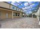Screened patio with pergola and pavers at 1827 Pisgah Ln, Apopka, FL 32712