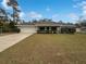 Single-story house with attached garage and well-maintained lawn at 2193 Sw 153Rd Loop, Ocala, FL 34473