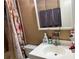 Bathroom features a vanity with sink and shower at 262 Scottsdale Sq # 262, Winter Park, FL 32792