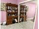 Bedroom with wooden bookcase and mirrored closet doors at 262 Scottsdale Sq # 262, Winter Park, FL 32792
