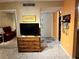 Living room with tiled floors and a sofa at 262 Scottsdale Sq # 262, Winter Park, FL 32792