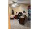 Home office with desk, chair, and ceiling fan at 262 Scottsdale Sq # 262, Winter Park, FL 32792