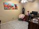 Home office with desk, chair, and large artwork at 262 Scottsdale Sq # 262, Winter Park, FL 32792