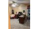 Home office with desk, chair, and ceiling fan at 262 Scottsdale Sq # 262, Winter Park, FL 32792