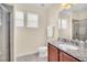 Bathroom with single vanity and shower at 611 Lasso Dr, Kissimmee, FL 34747