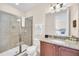 Bathroom with shower/tub combo and granite vanity at 611 Lasso Dr, Kissimmee, FL 34747