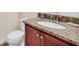Clean bathroom with granite countertops and updated fixtures at 611 Lasso Dr, Kissimmee, FL 34747