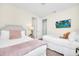Bedroom with king and twin beds, plus a TV at 611 Lasso Dr, Kissimmee, FL 34747